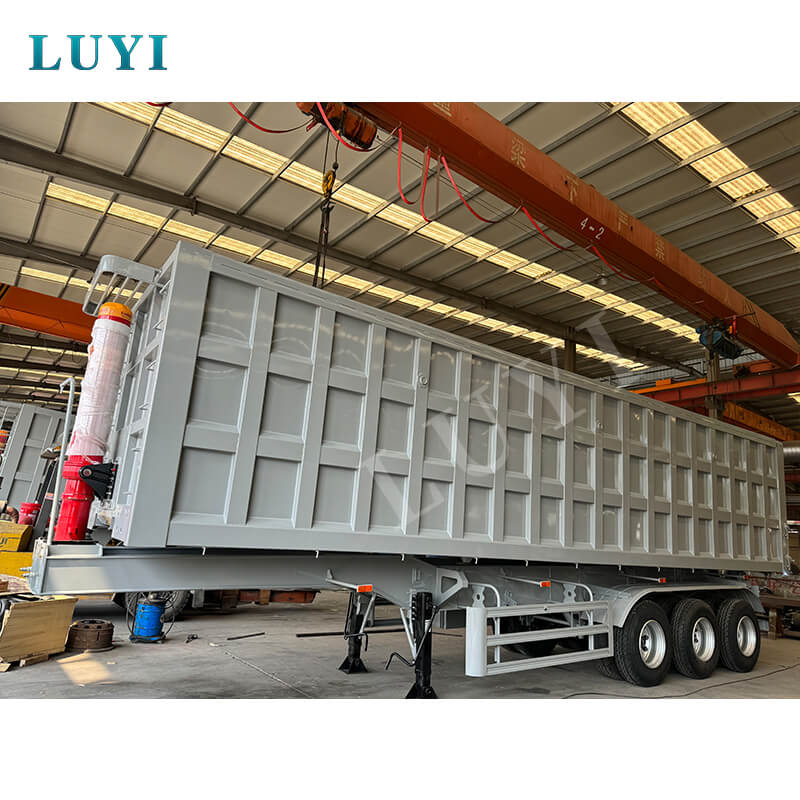 アフリカの物流のアップグレードを促進：3軸リアティッピングダンプセミトレーラーのバッチがタンザニアに到着